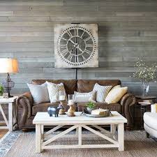 Then you can have a glass piece, a metal etagere, and fabrics. all white upholstery and white walls are a blank canvas for an eclectic mix of accessories in this hamptons farmhouse. Design Styles Schneiderman S The Blog Design And Decorating Farm House Living Room Brown Couch Living Room Modern Farmhouse Living Room