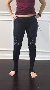 Alo goddess leggings with floral pattern and white ribbed legs. Fit Review Friday Alo Yoga Leggings Goddess Ribbed Legging Airbrush Legging