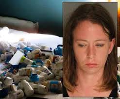 Pictures show massive amount of stolen pills in woman's home