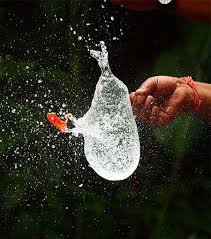 High speed photography balloon full of water photographed in the exact instant of impact and breaking black background download stock photo. Balloon Burst Explored High Speed Photography Shutter Speed Photography Photography