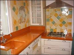 The orange color is able to make your kitchen area looks fresh. Orange Kitchen Decorating Ideas For A Vital Atmosphere