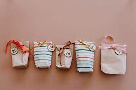 Seal with tape and fold the bottom end up. Make A Gift Bag Out Of Wrapping Paper So Easy Clever Poppy