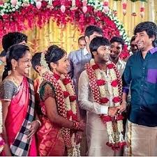 Pin On Siva Sivakarthikeyan and wife aarthi s romantic moment namma veettu pillai audio launch. pin on siva