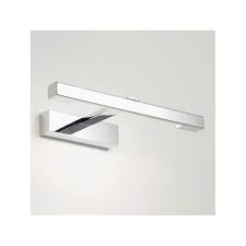 The outside has a chrome finish with a white diffused light coming. Modern Bathroom Wall Light In Chrome Great Over Mirror Light Ip44