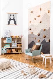 I'm also very curious to see how it holds up with my 6 kids! Stylish Scandinavian Interior Design Of Childroom With Gray Sofa Stock Photo Picture And Royalty Free Image Image 149646051