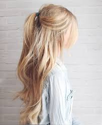 Accent braids add interest to an otherwise simple bun hairstyle and help to give your overall style a more boho vibe which we all know is a key look when it comes to creating summer hairstyles for long hair. 5 Lazy Day Hairstyles Long Hair Styles Hair Styles Lazy Day Hairstyles