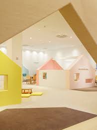 Soft Colours Are Perfect For This Childcare Centre Designed By Emmanuelle Moureaux This Vibrant Indoor Playground Kindergarten Interior Daycare Design Design