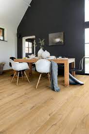 Installation involves applying an adhesive and grout system, much like ceramic or porcelain tiles. Quick Step Impressive 8mm Laminate Flooring Mckenzie Willis