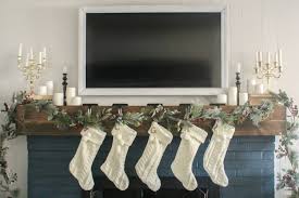 Focus on the ends of the mantel. How To Create A Classic Christmas Mantel Around An Ugly Tv Lovely Etc