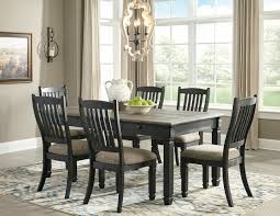 Rooms to go dining room furniture comes in a variety of shapes and sizes for a flawless fit in any space. The Tyler Creek Black Gray Rectangular Dining Room Table Available At Gibson Mcdonald Serving Waycross Ga And Surrounding Areas