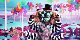 Who do you think is hiding inside the penguin costume? The Masked Singer Who Is Squiggly Monster Screen Rant