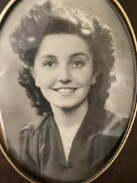 I love this photo. She died when I was 22 in 1985. I don't have any videos  of her. If you could colour this for me and just make her smile and