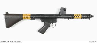 Replica of model sterling smg l2 a3 s&t. Isn T The F1 Smg Basically An Australlian Sterling With A Wooden Stock That Feeds From The Top Rather Than The Side Forgottenweapons