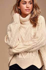 White cashmere knitted turtleneck jumper from saint laurent featuring a ribbed edge, a knitted construction, a roll neck and long sleeves. Chic Cream Sweater Cable Knit Sweater Turtleneck Sweater Lulus
