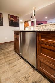 Lighting can easily change the mood. Remodeled Basement With Wet Bar Degnan Design Build Remodel