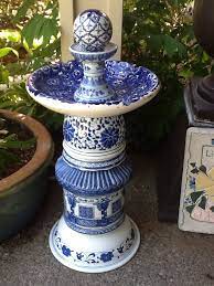 Blue and white ceramic bird bath. Blue And White Patterned Ceramic Garden Totem Bird Bath The Bowl Is A Large Hand Thrown Pottery Ashtray From Mexi Glass Garden Art Garden Art Diy Garden Totem