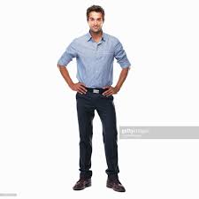 Portrait Of Young Business Man Standing With Hands On Hips And Man Standing Hands On Hips Business Man
