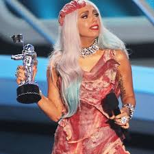 Lady gaga has recreated her iconic meat dress outfit and strapped on other famous outfits to encourage fans to get out and vote in the u.s. Meat Dress Mtvcollections