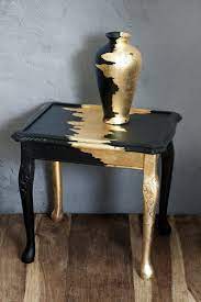 salontafel meubel vintage tafel meubelen bladgoud houten handgemaakte zwarte en gouden vaas woonkame gold leaf furniture coffee table furniture table furniture