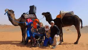 Camels transport goods across the sahara desert. Can Someone In A Wheelchair Travel To Morocco Morocco Accessible Travel