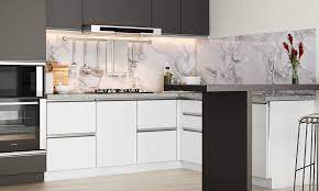 The hood features white tempered glass that conceals the filter and provides a seamless integrated look in your kitchen design. Modular Kitchen Chimney Designs Design Cafe