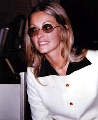 Lately I've been looking more into which designers Sharon wore. Most of  what I've been seeing has been related more to her...