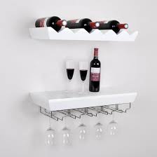 The material and design choose one with an upper shelf to display glasses or home decor accents. Amazon Com Welland White Wine Rack Floating Wall Shelf With Glass Holder White Wine Rack Wine Rack Shelf Hanging Wine Rack