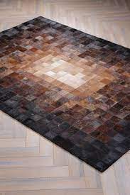 Onloom Kuhfell Teppich Supernova Bei Dem Fellteppich Super Nova Werden Fellteile Zu Einem Einmaligen Kunstwerk Zusammengefugt Kuhfell Teppich Teppich Kuhfell