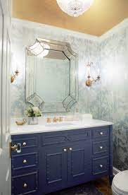 Landmark building slim floating vanity in wood with accent wall in stone [from: 10 Small Powder Room Vanity Ideas You And Your Guests Will Both Love