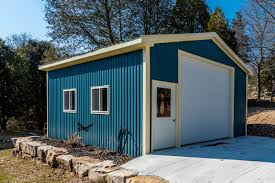 Taylor's code for peak height cannot be higher than house, 14′ 6″. Steel Garage Building Cdn Buildings