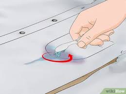 Gently rub the mixture in to the fabric, respraying vinegar as necessary. 3 Ways To Get Dye Out Of Clothes Wikihow