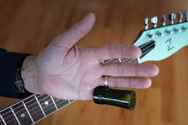 And then there was the inventive guitarist who, many decades ago, decided to slip a bottle over his finger and slide it along his guitar's strings to produce a magical sound (he probably emptied the bottle himself, if you know what i mean). Dust That Broom A Newbie S Guide To Slide Premier Guitar
