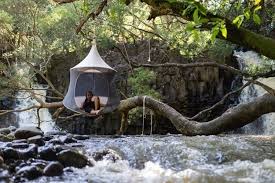 'treepod' is a cross between a hammock and a bungalow. Treepod Cabana