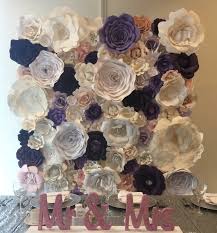 These beautiful hand made and crafted purple large paper flowers create a lovely paper flower backdrop. Paper Flowers Prairie Love