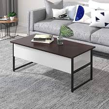 This rising coffee table features a round design that doesn't only complement any home décor style but also saves space. Joolihome A Space Saving Coffee Table That Easily Facebook