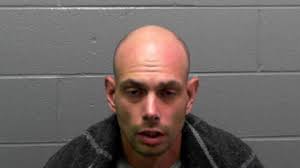 Man charged after allegedly firing at vehicle