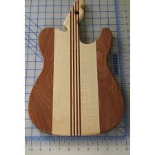 The signature tones of a tele is the bridge pickup soloed and the sound of both pickups in parallel. Tele Guitar Cutting Board Sapele Mahogany And Maple