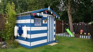 Beach Hut Themed Garden Shed This Is Painted With Cuprinol Jasmine White And Barleywood Blue Beach Hut Shed Painted Shed Beach Themed Outdoor Decor