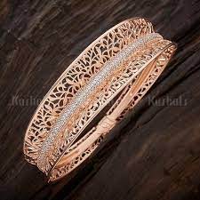 Designer Zircon Kada Studded With Zircon Stones Plated With Rose Gold Polish And Made Of Gold Jewelry Outfits Bangles Jewelry Designs Diamond Bracelet Design
