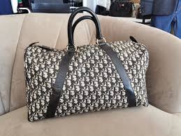 Sac Dior Vintage 24h Le Fermoir De Mon Sac Pour ma part j'avoue une préférence pour le sac polochon. sac dior vintage 24h