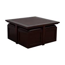 The coffee table features a thick table top proving the sturdiness and will ensure it'll last year after year. 82 Off Macy S Macy S Cherry Wood Square Coffee Table With Seat Storage Tables