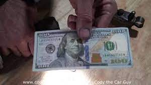 How To Spot A Fake 100 Dollar Bill - Youtube