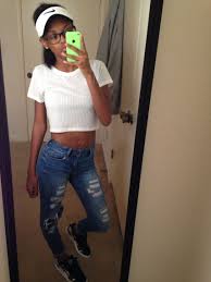 Black And White Nike Outfits White Crop Top Ripped Jeans Black White Pumas And White Nike Hat Outfit Outfits With Hats White Nike Hat Nike Hats Outfit