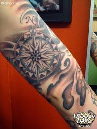 We have been voted best tattoo shop in fort wayne in for over 6 years and our work speaks for itself. Compass And Waves Hidden Hand Tattoo Seattle Wa Hand Tattoos Seattle Tattoo Shops Black And Grey Tattoos