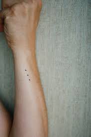 The spirals represent the twists and turns in life, while the straight line is enlightenment. 2 Dot Tattoo Meaning Cuticle Dot Tattoo Meaning