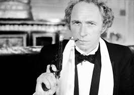 Pierre Richard lights his cigarette