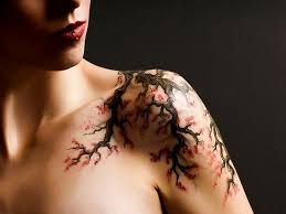 In fact, the most common cherry tree in japan is somei yoshino which has largely white blossom with only the faintest hint of pink on the petals. Cherry Blossom Tattoo Designs Understanding The Meaning Of Sakura