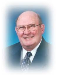 1962(?) First Communion Class. Holy Family Parish & School at 37th &  Sheridan Blvd. Later to become Cathedral of the Risen Christ. I'm in the  top row, far left.