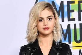 Was looking in the mirror trying to find a new reflection wanna take the road less traveled in a different direction make some new mistakes forget the ones i've made cry. Selena Gomez Debuts Blond Hair American Music Awards Red Carpet Fitforhealth News
