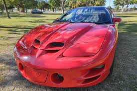 Image result for Bright Red 2001 Pontiac